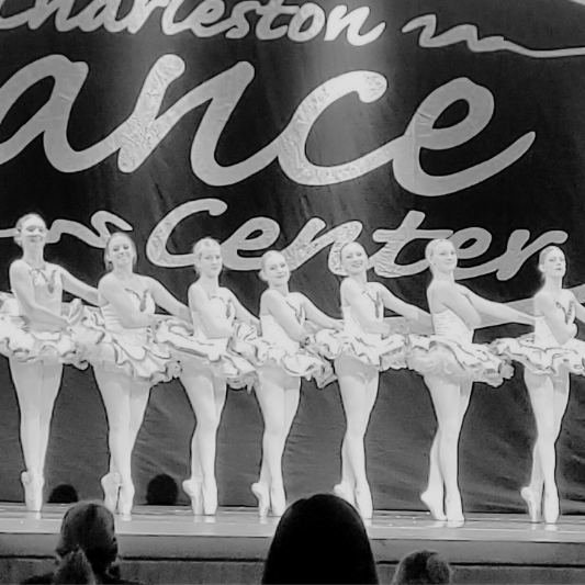 Graceful ballet dancers on pointe performing at Charleston Dance Center.